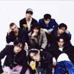 Stray Kids members Bang Chan, Lee Know, Changbin, Hyunjin, Han, Felix, Seungmin, and I.N posing for a professional group photoshoot.