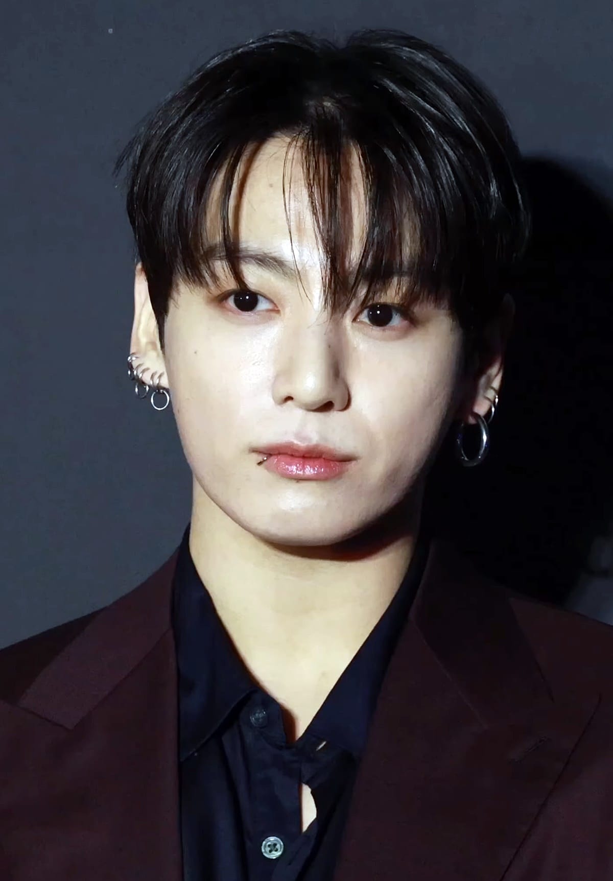 BTS journey from 2013 to 2026 represented by Jungkook of BTS as a global K-pop icon.